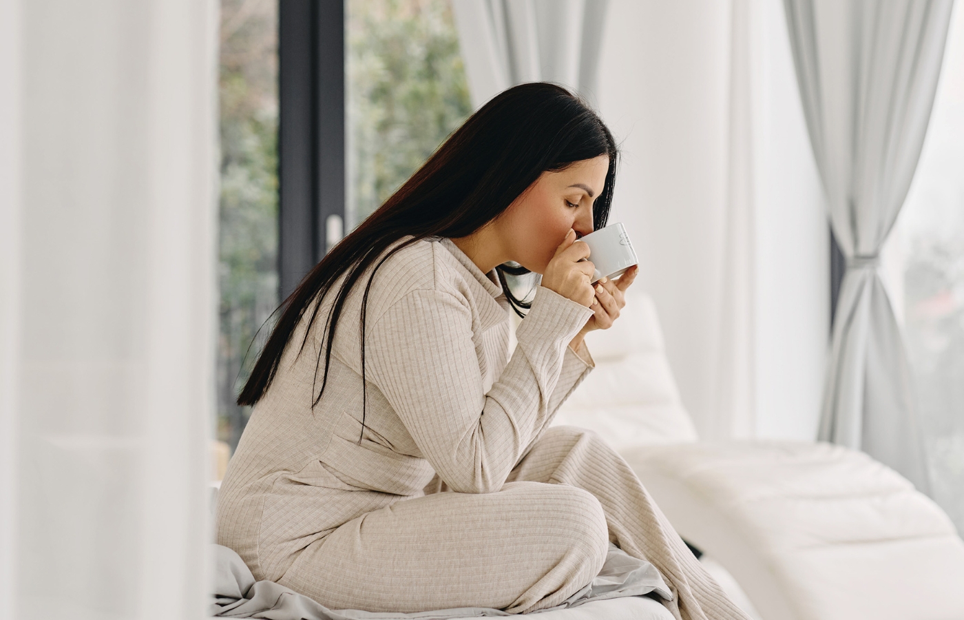 woman sips her coffee and learns answer to Will Therapy Work for Me